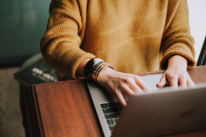 Woman searching for RevOps job on computer